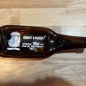 Vintage Flattened Brown Glass Bottle with Cartoon Graphic
